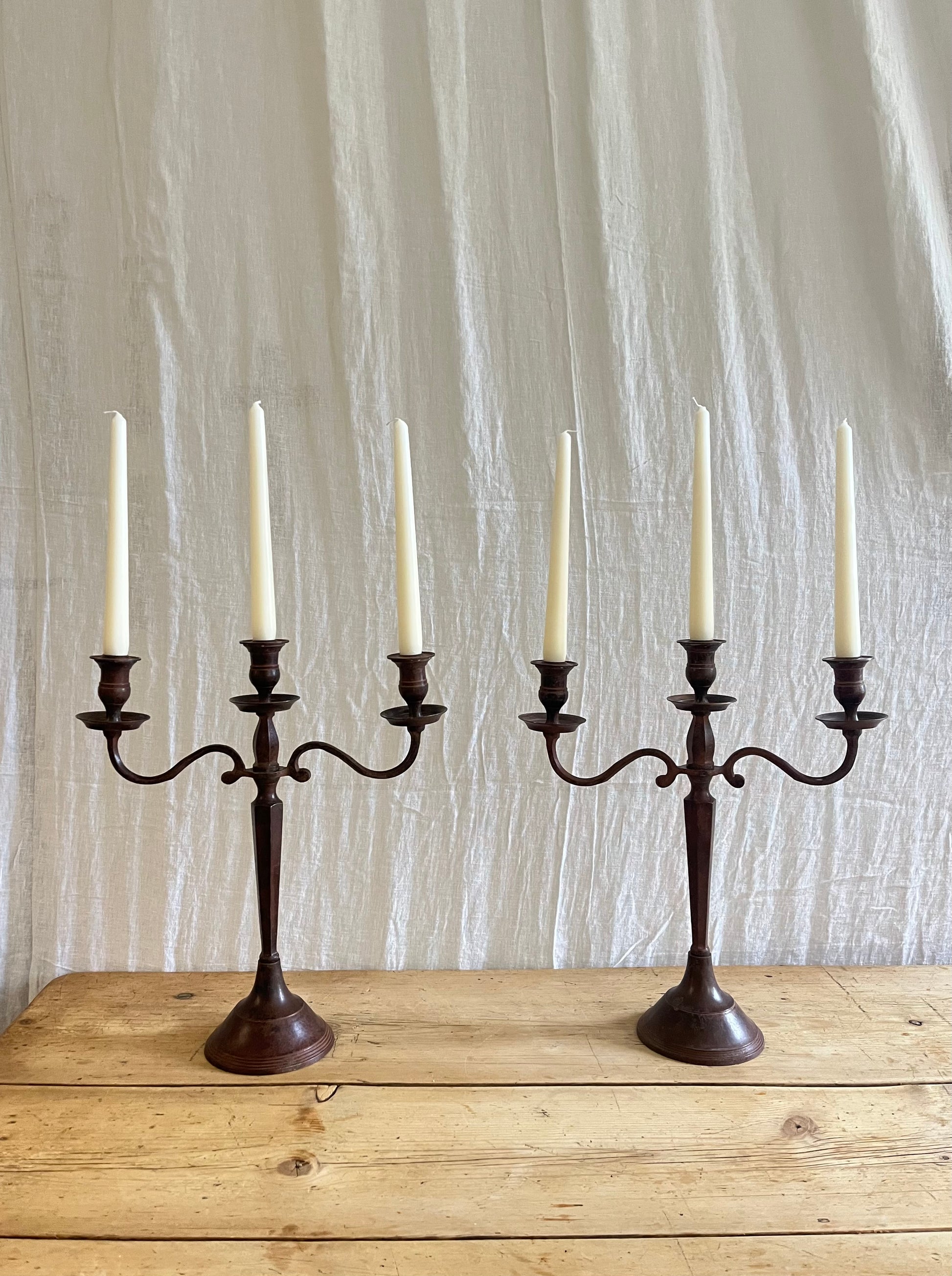 Pair of antique Edwardian cast metal candelabras