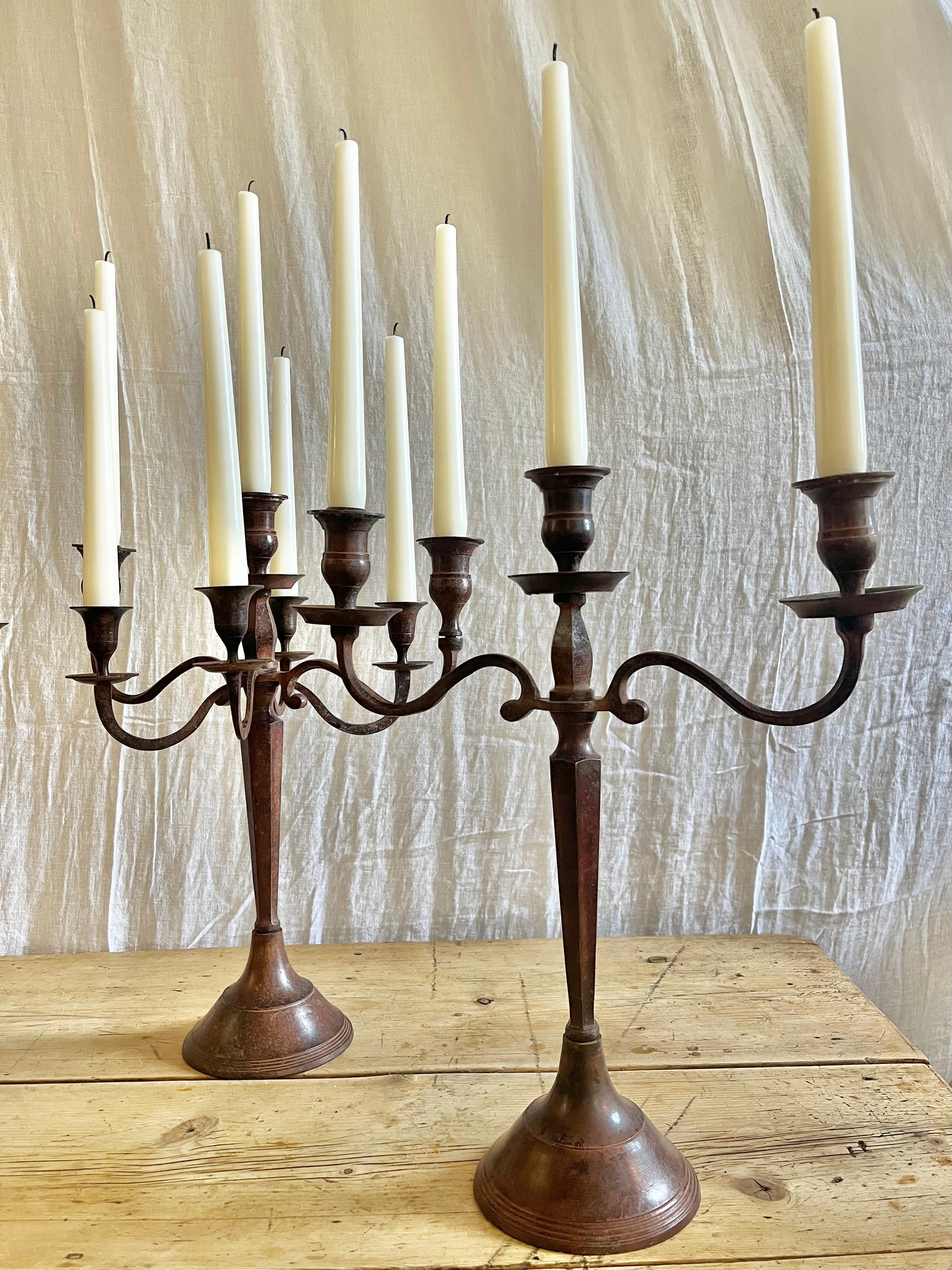 Pair of antique Edwardian cast metal candelabras