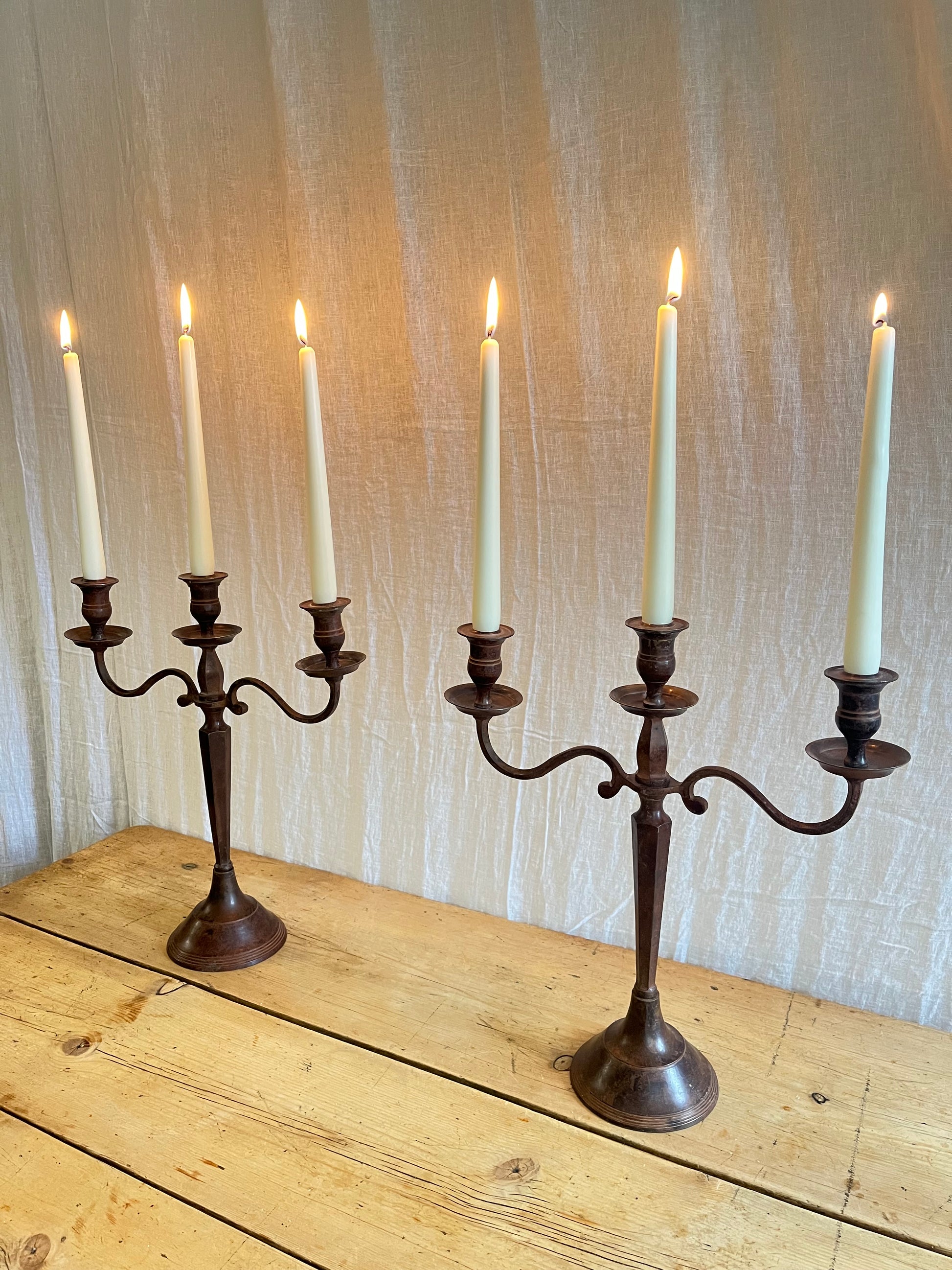 Pair of antique Edwardian cast metal candelabras