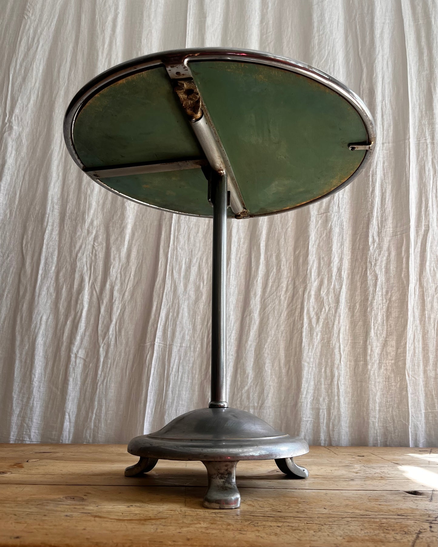 Vintage 1930s Art Deco stainless steel bistro coffee table from below
