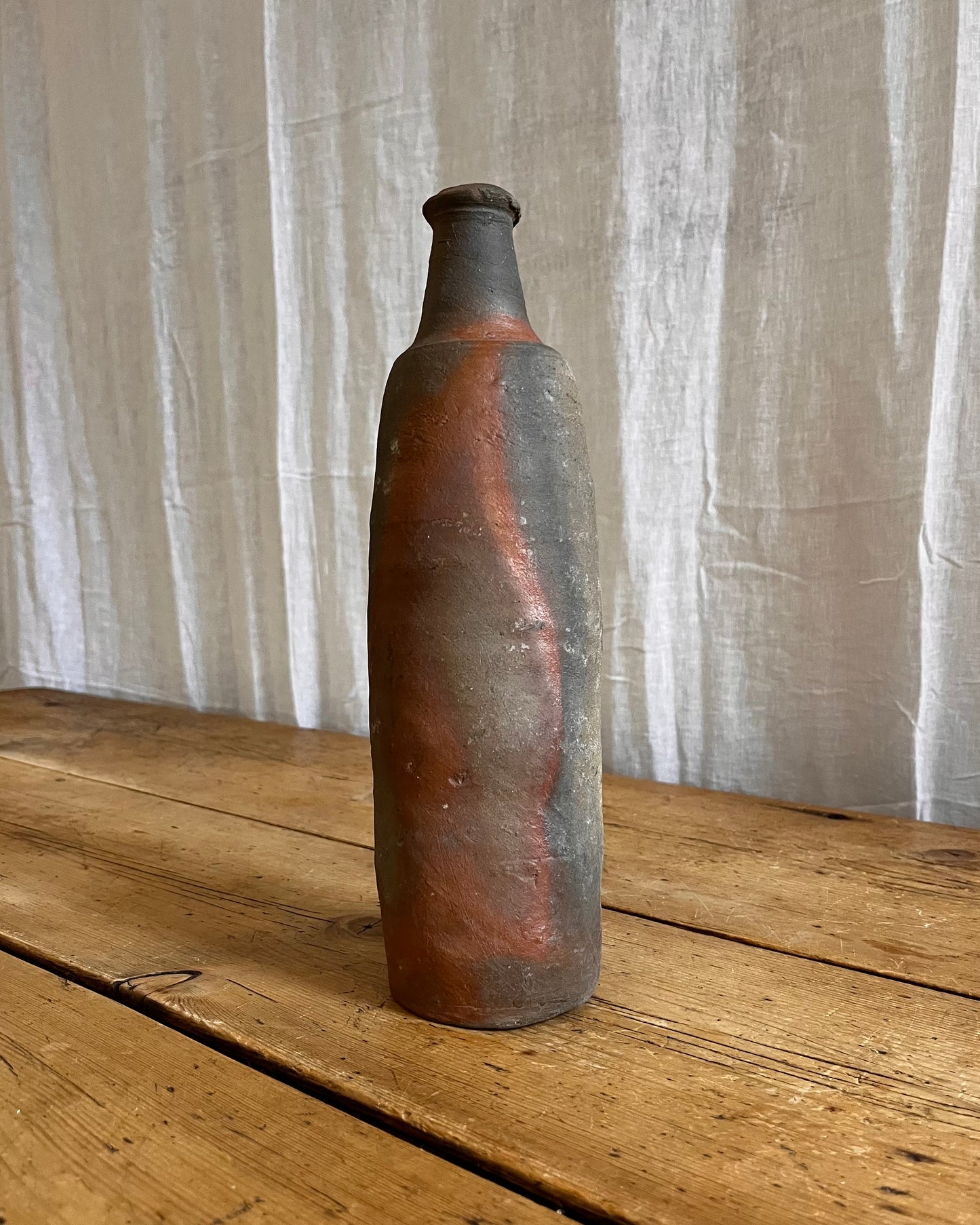 A Set Of French Clay Irregular Cider Bottles