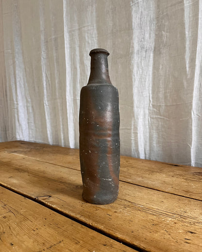 A Set Of French Clay Irregular Cider Bottles