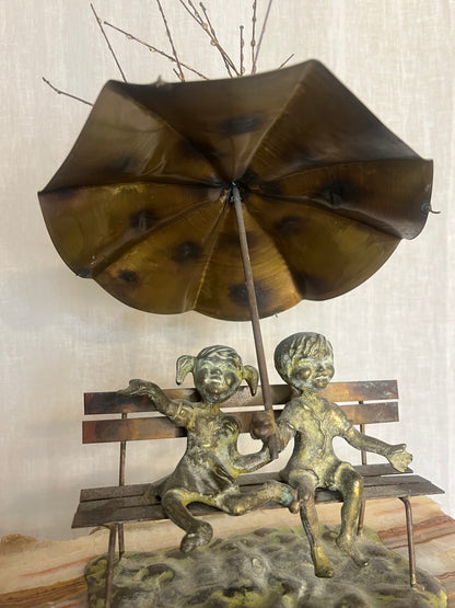 “Boy and Girl Under The Rain” By Bijan